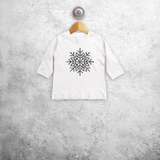 Baby or toddler shirt with long sleeves, with glitter snow star print by KMLeon.