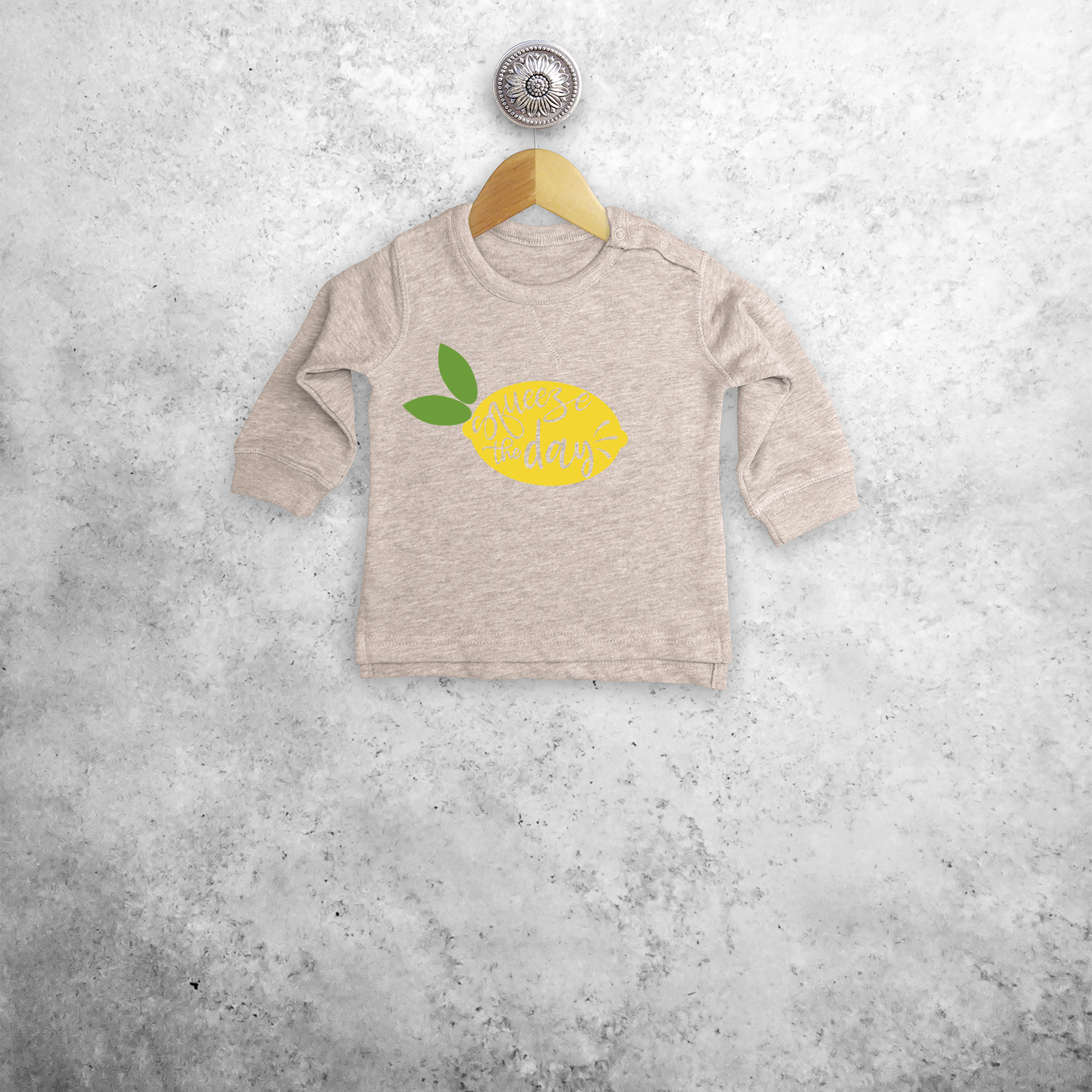 'Squeeze the day' baby sweater