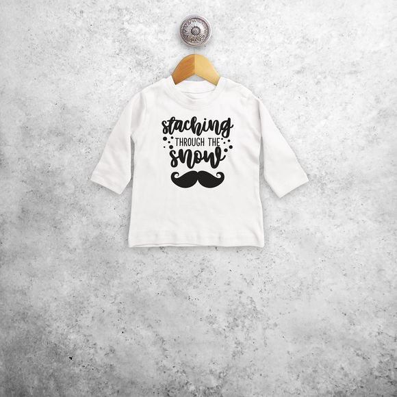 Baby or toddler shirt with long sleeves, with ‘Staching through the snow’ print by KMLeon.