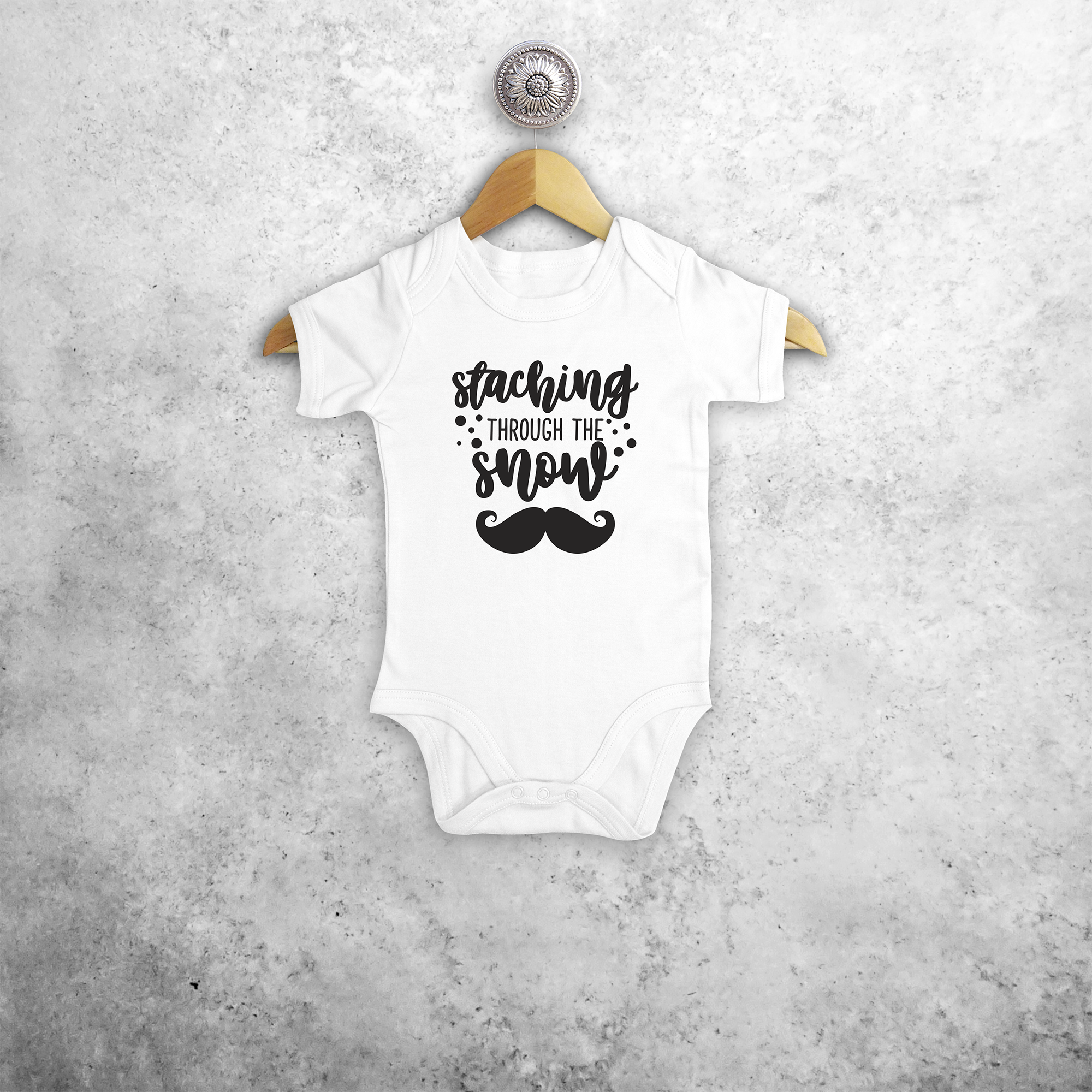 Baby or toddler bodysuit with short sleeves, with ‘Staching through the snow’ print by KMLeon.