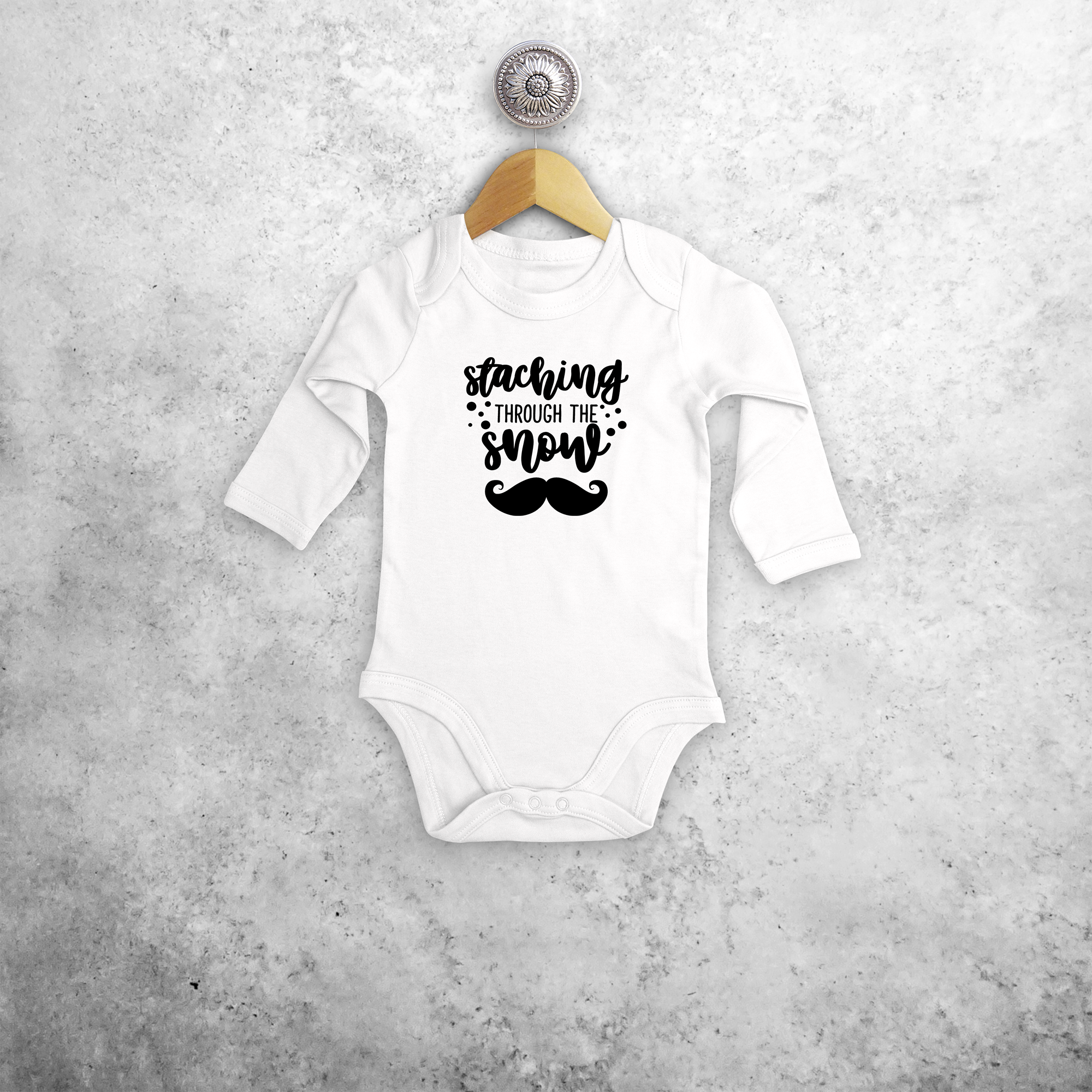 Baby or toddler bodysuit with long sleeves, with ‘Staching through the snow’ print by KMLeon.