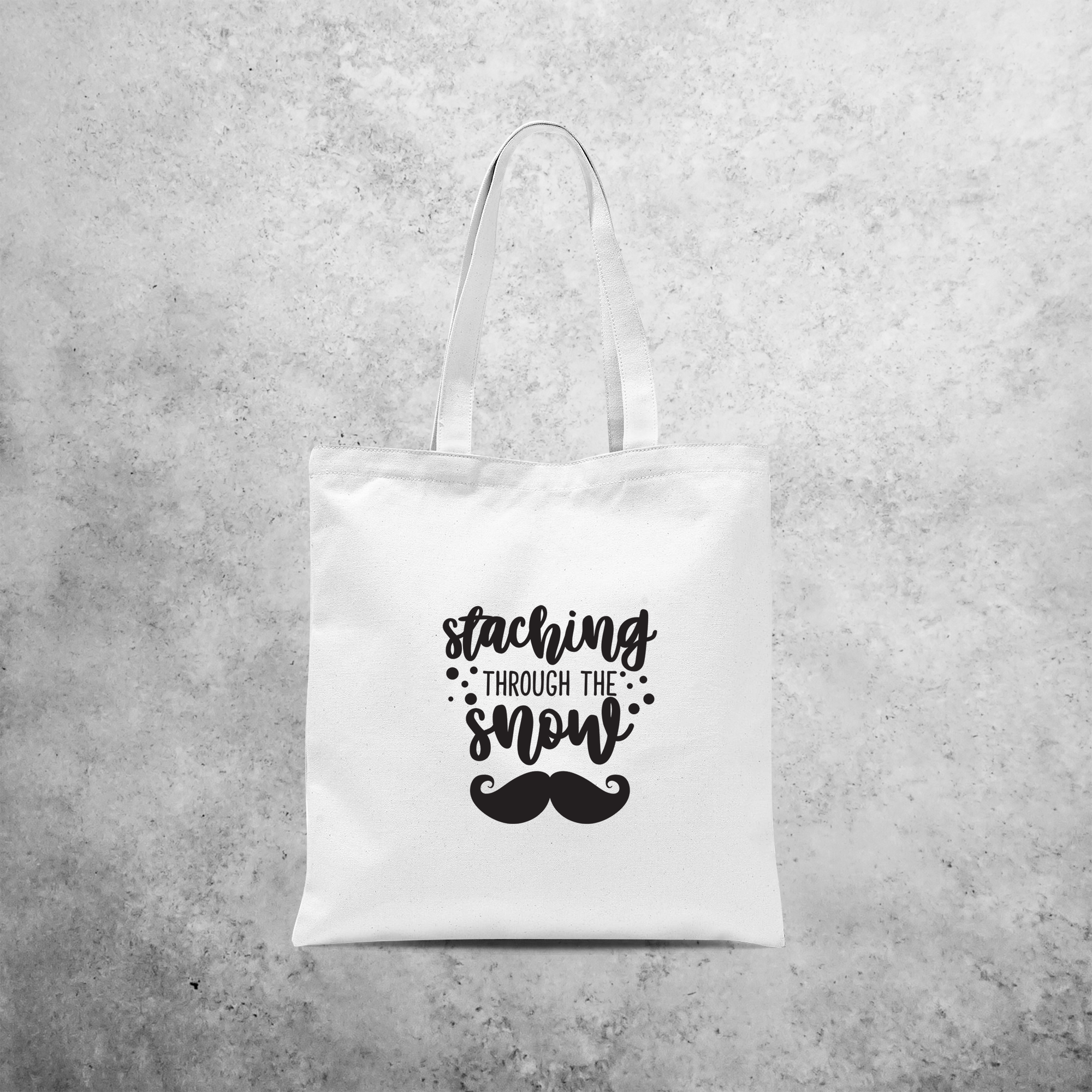 Tote bag, with ‘Staching through the snow’ print by KMLeon.