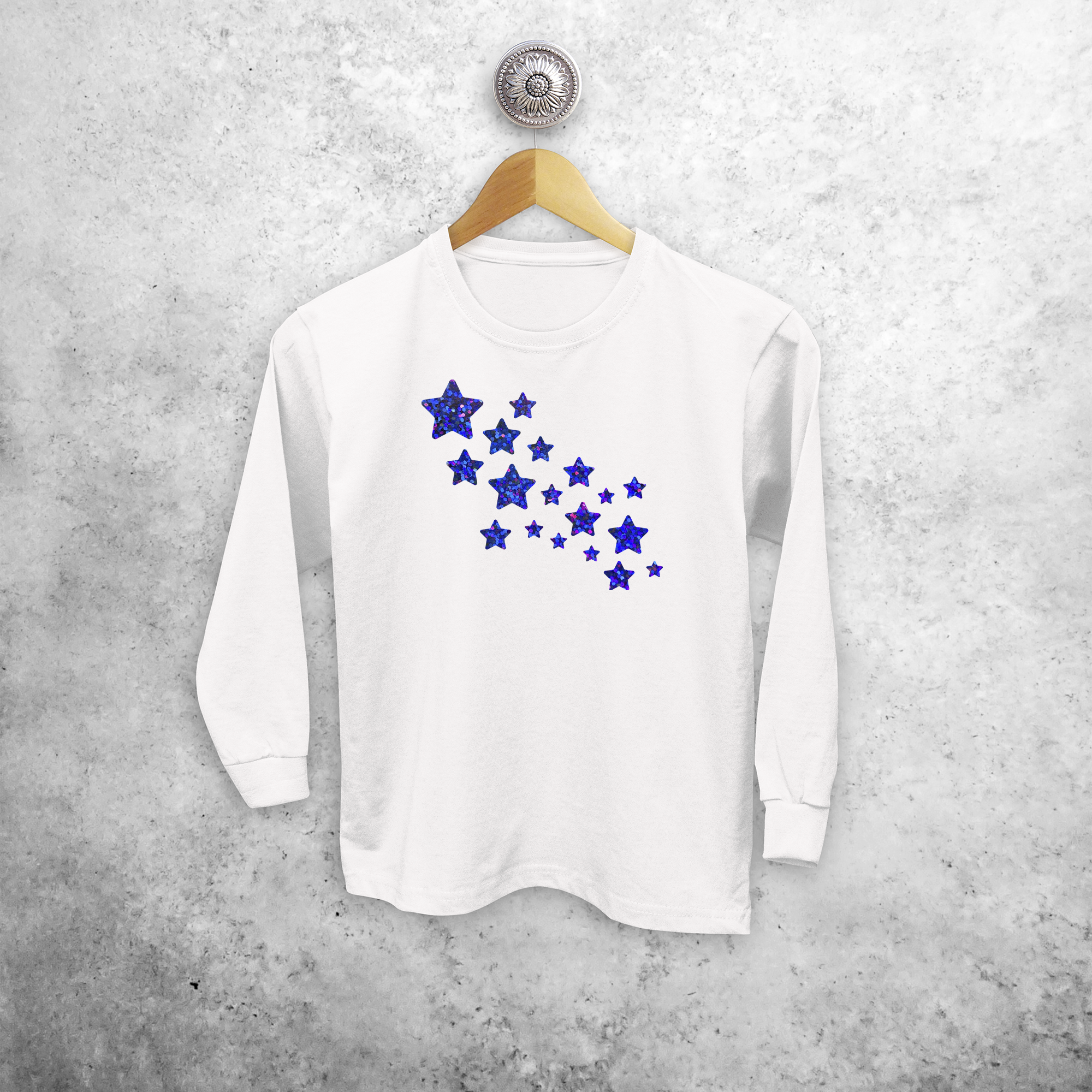 Kids shirt with long sleeves, with sparkly blue stars print by KMLeon.