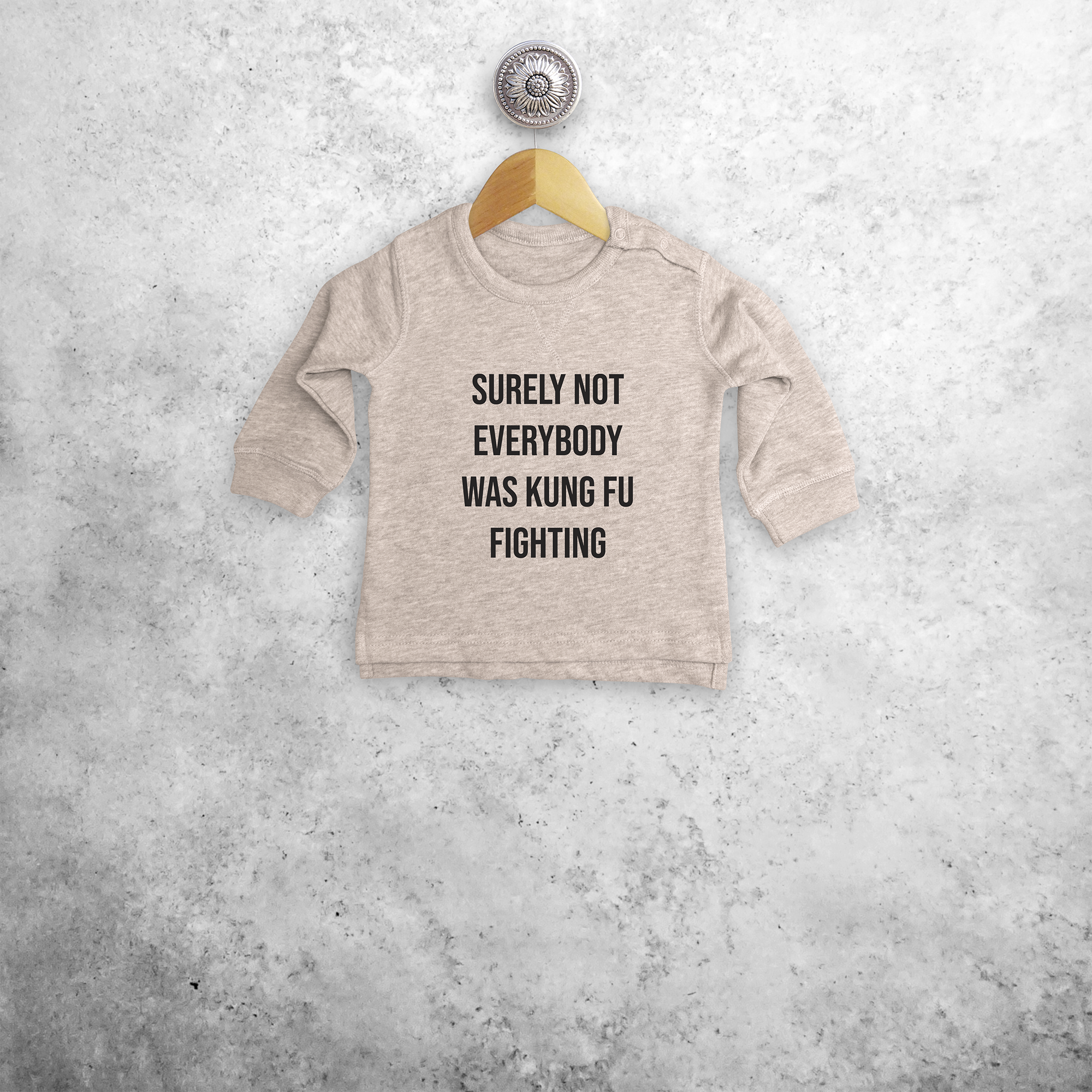 'Surely not everybody was kung fu fighting' baby sweater