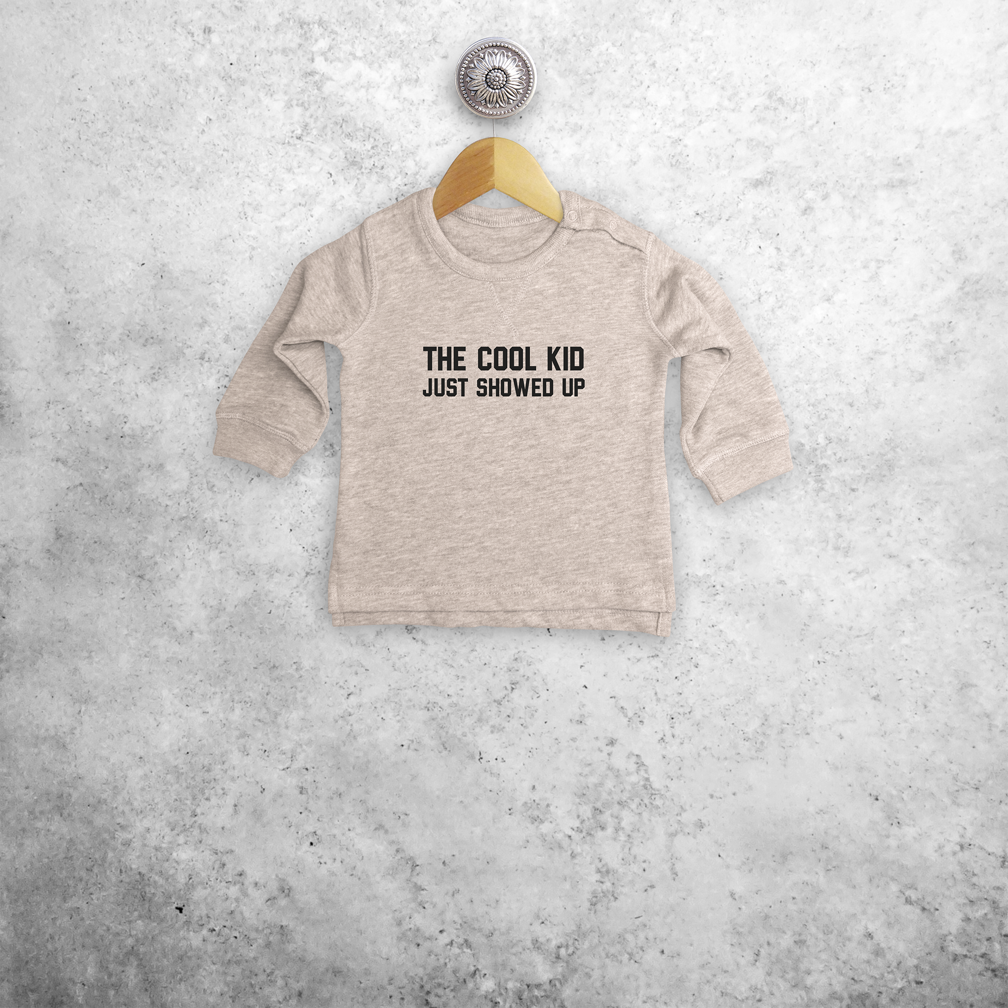 'The cool kid just showed up' baby sweater