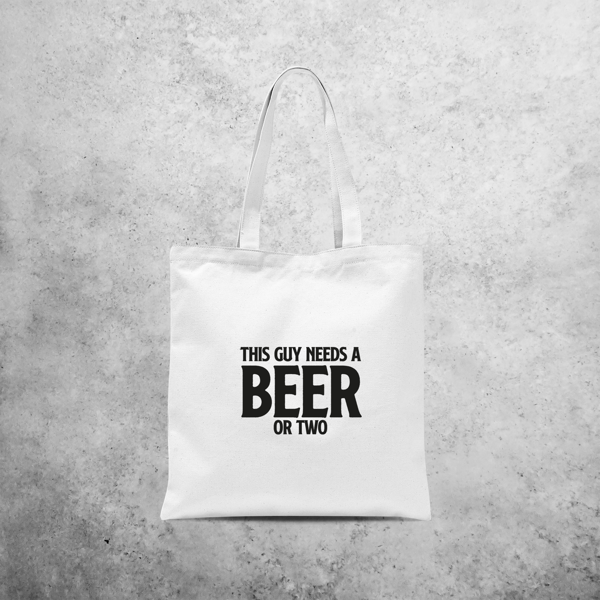 'This guy needs a beer or two' tote bag