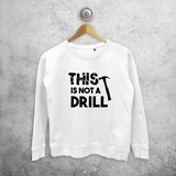 'This is not a drill' sweater
