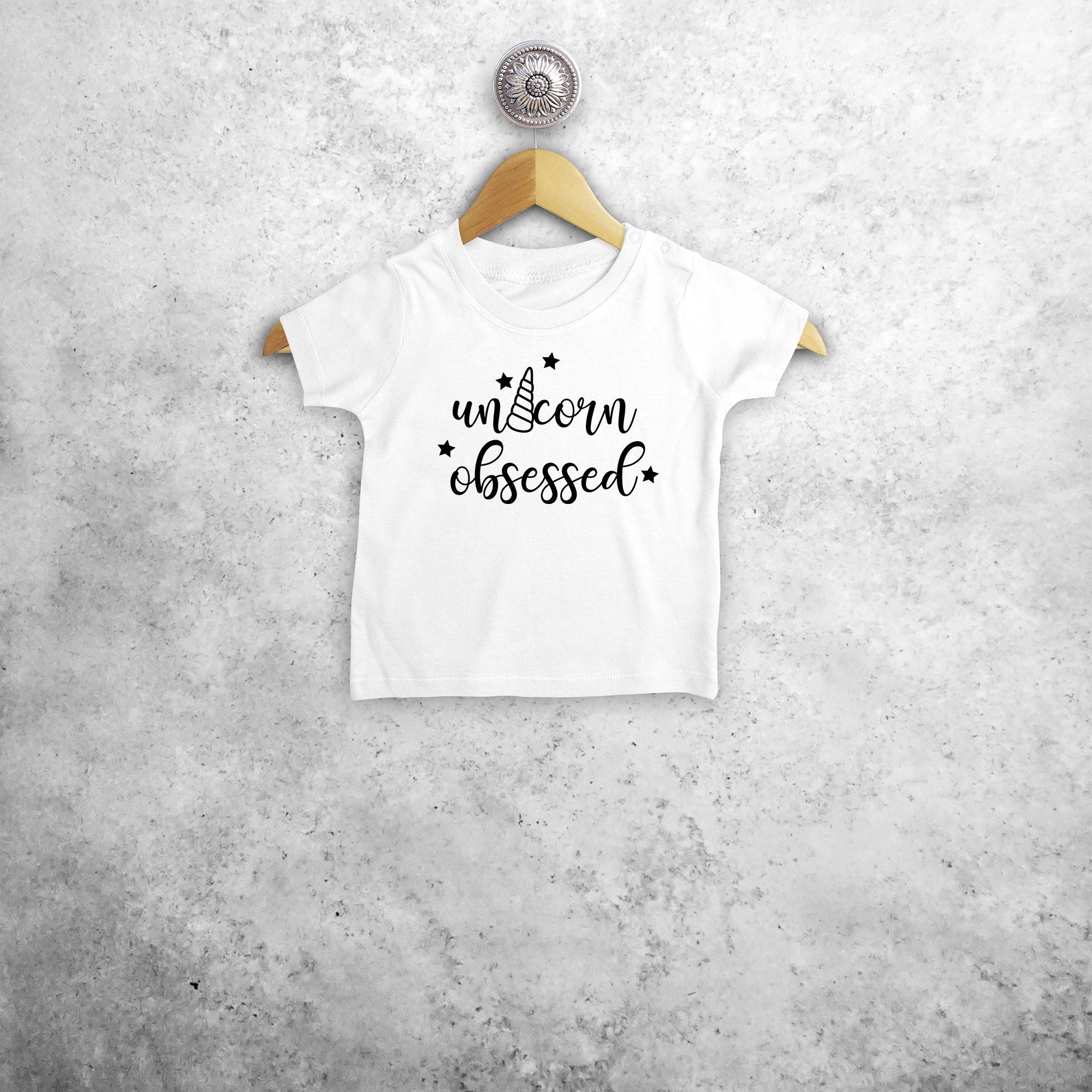 'Unicorn obsessed' baby shirt met korte mouwen