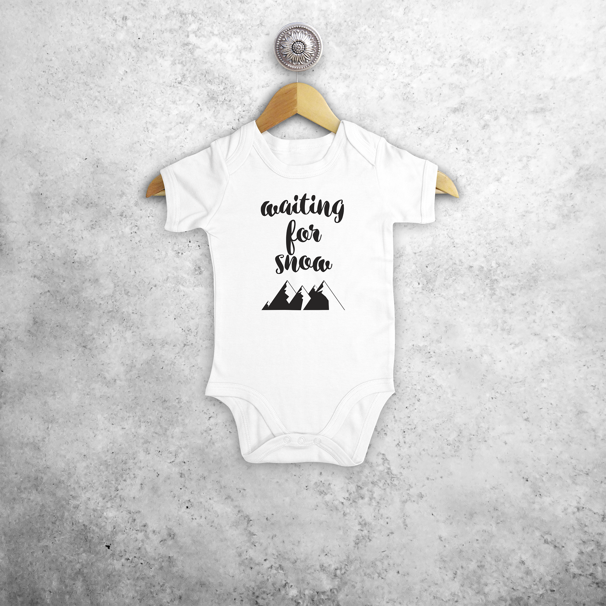 Baby or toddler bodysuit with short sleeves, with ‘Waiting for snow’ print by KMLeon.