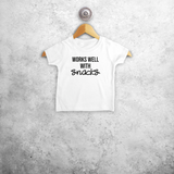 'Works well with snacks' baby shortsleeve shirt