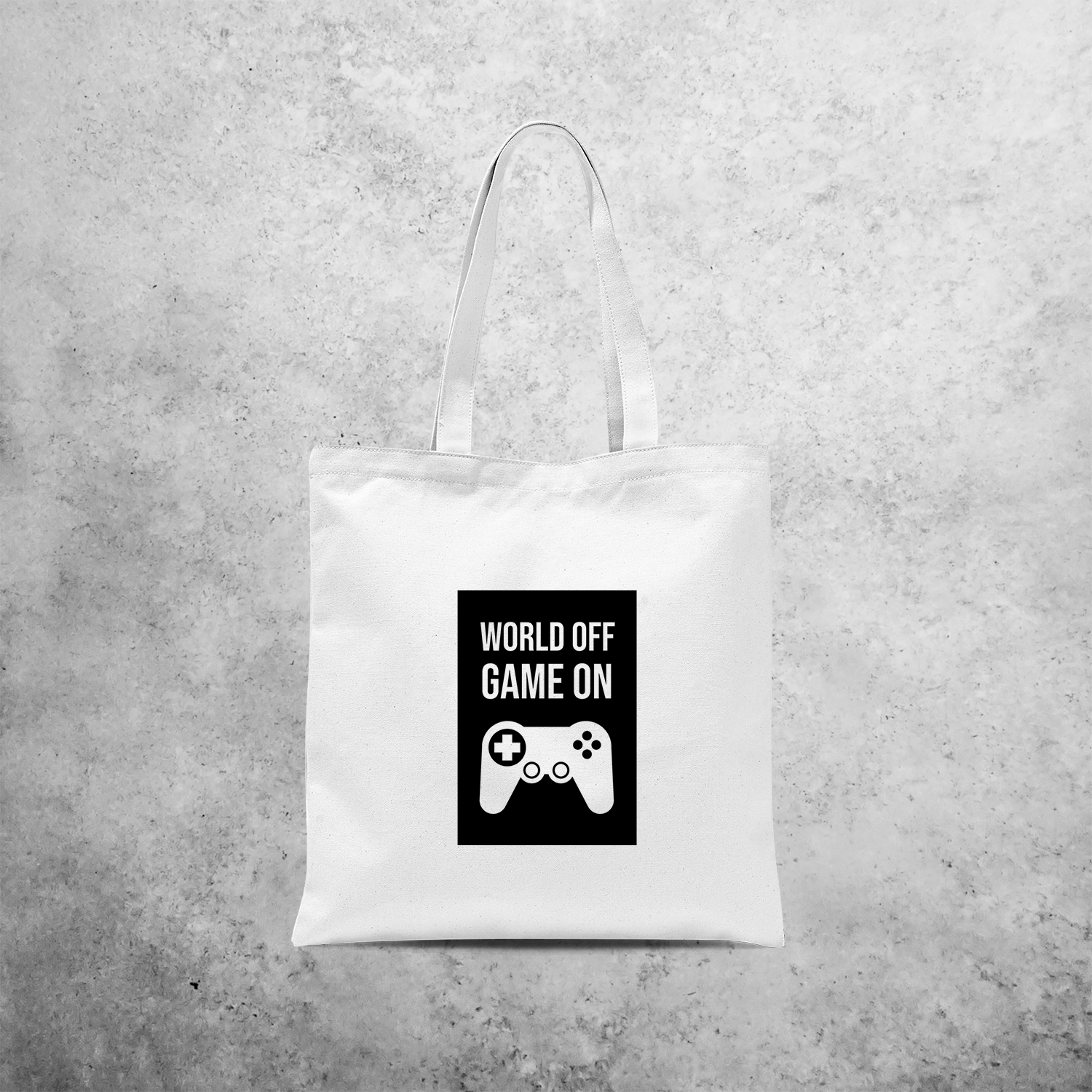 ‘World off – Game on’ tote bag